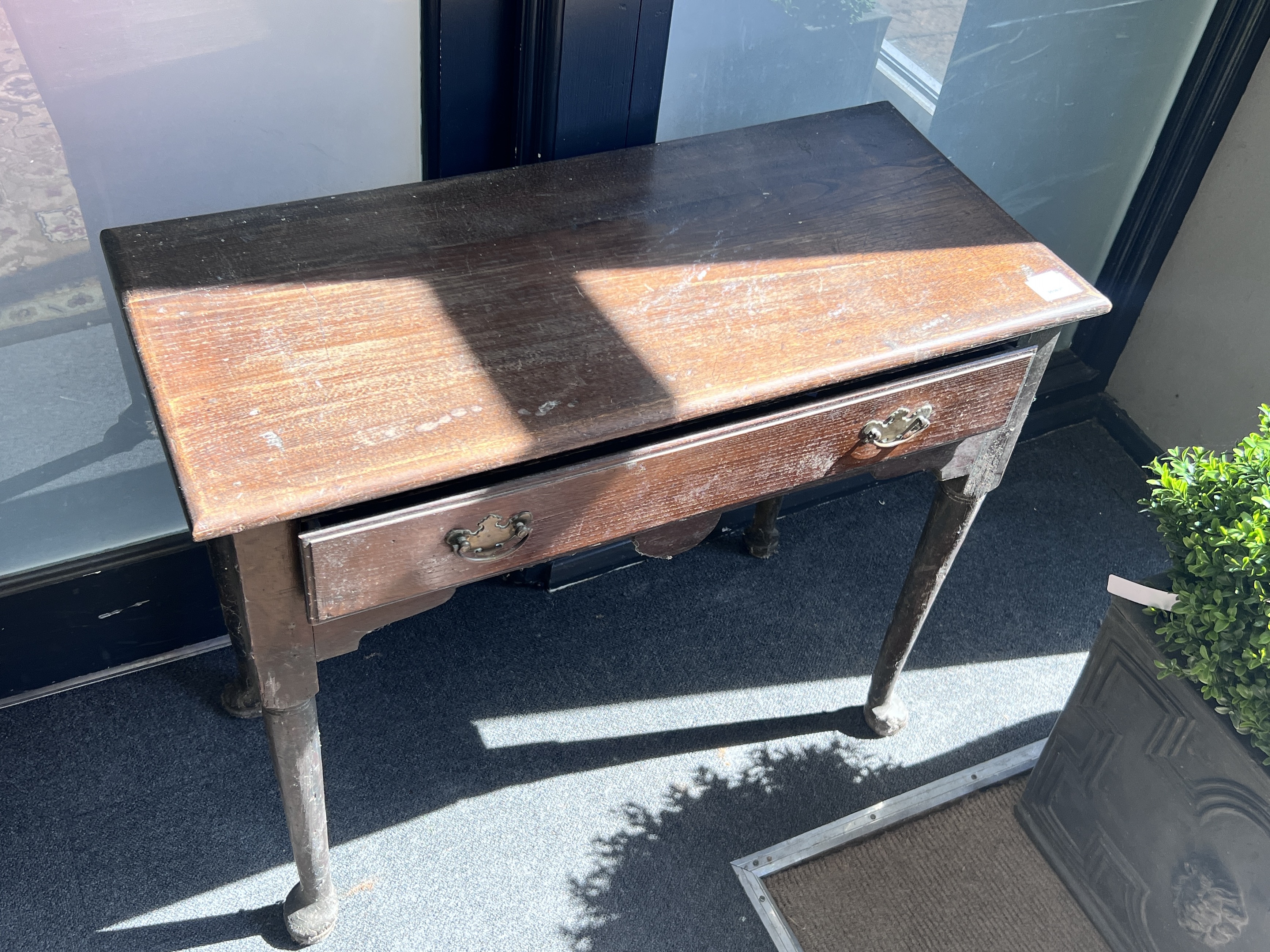 A George III style oak side table, width 82cm, depth 38cm, height 68cm